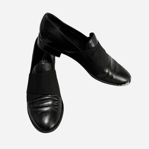 Stuart Weitzman Black Leather Loafers with Wide Crisscross Elastic Straps